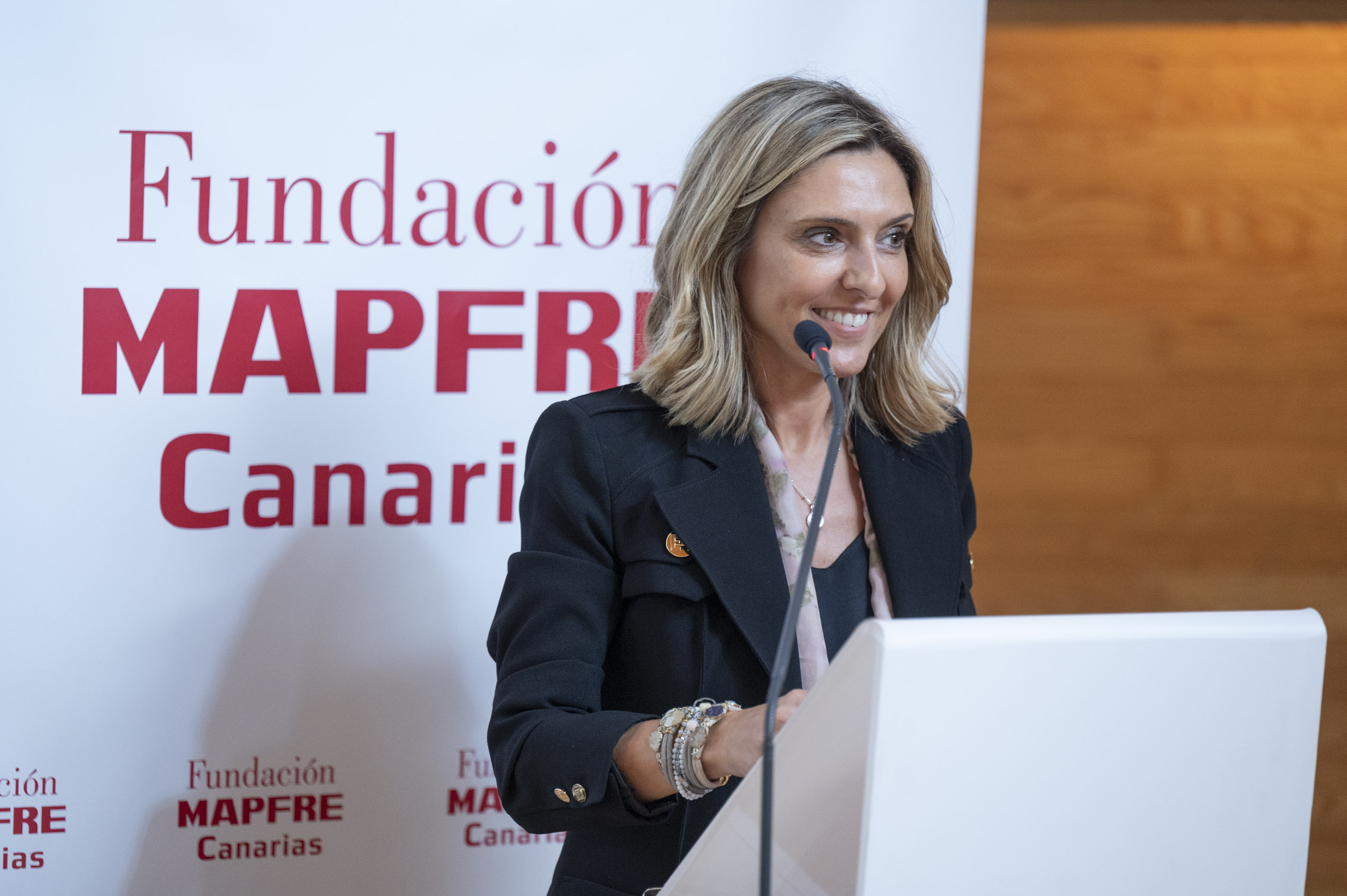 La directora General Territorial de MAPFRE Canarias, Eva Tamayo, durante su intervención en representación del voluntariado en Canarias.